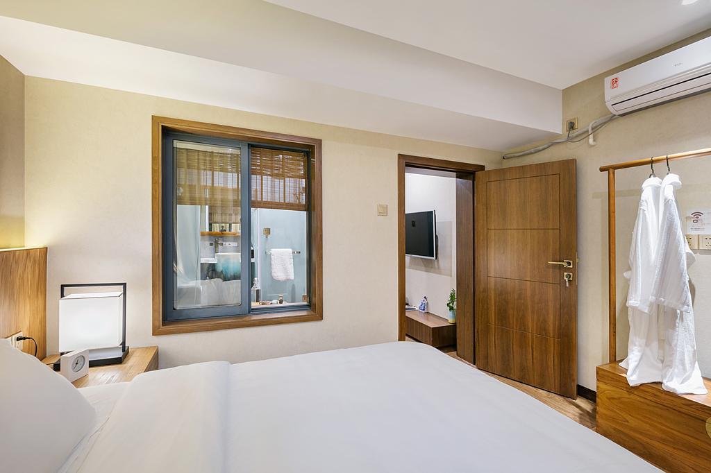 Hangzhou Puyu Travelling With Hotel Екстер'єр фото